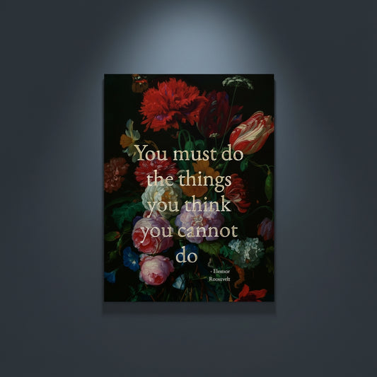 Fine Art Print Floral still life painting with a motivational quote in gold metallic foil text hanging on blue-gray background with spotlight lighting effect.