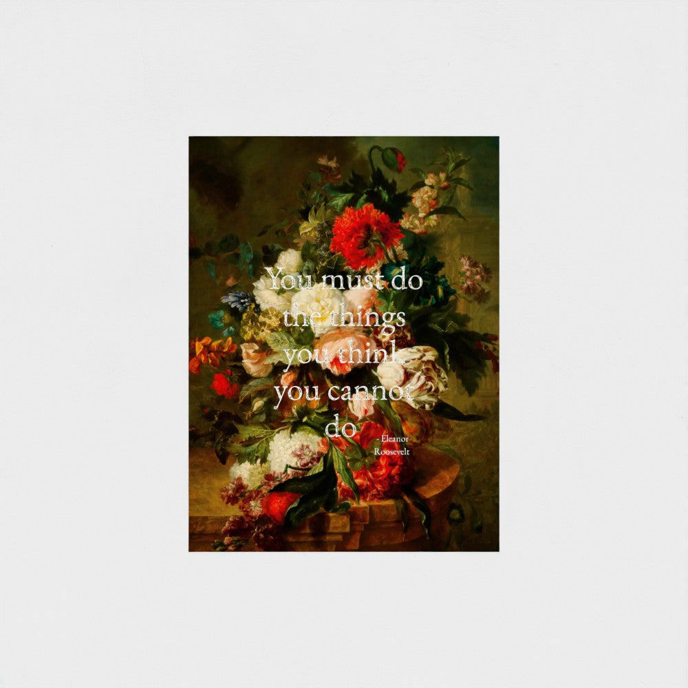 Floral still life painting with a motivational quote in gold metallic foil text hanging on white background to demonstrate contrast.  